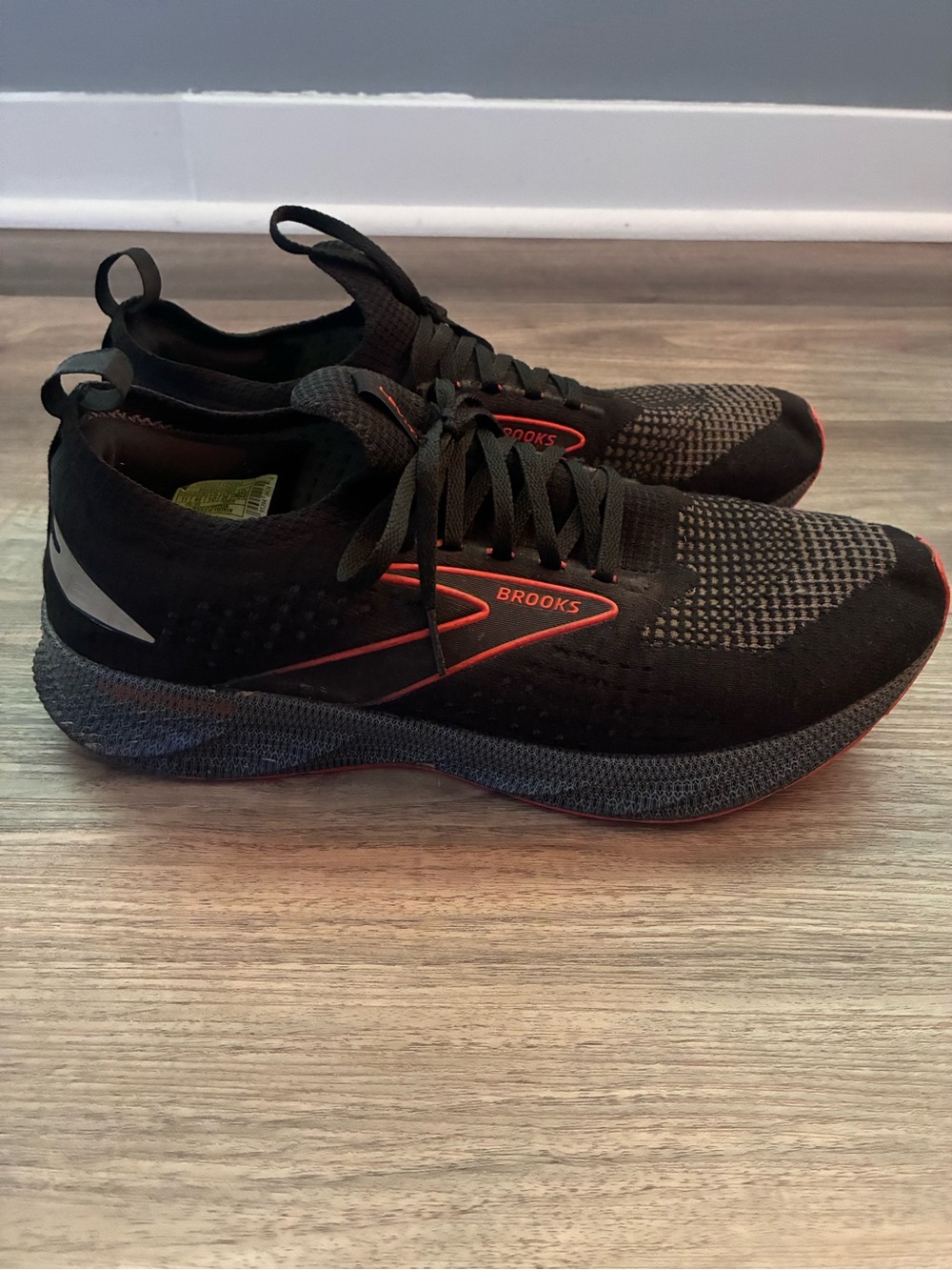 Brooks Men's Black Running Shoes with Red Accents levitate